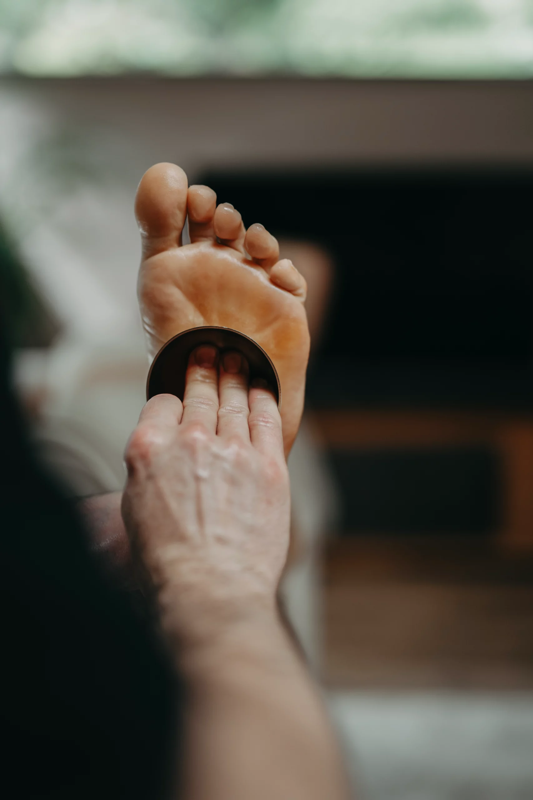 Massage des pieds au bol kansu